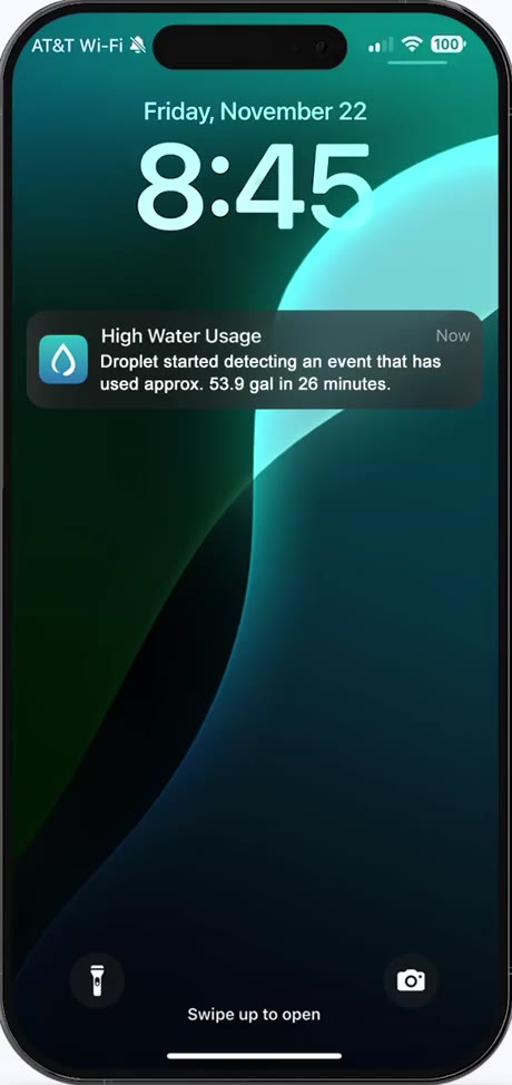 Droplet lock-screen leak notification on an iPhone.